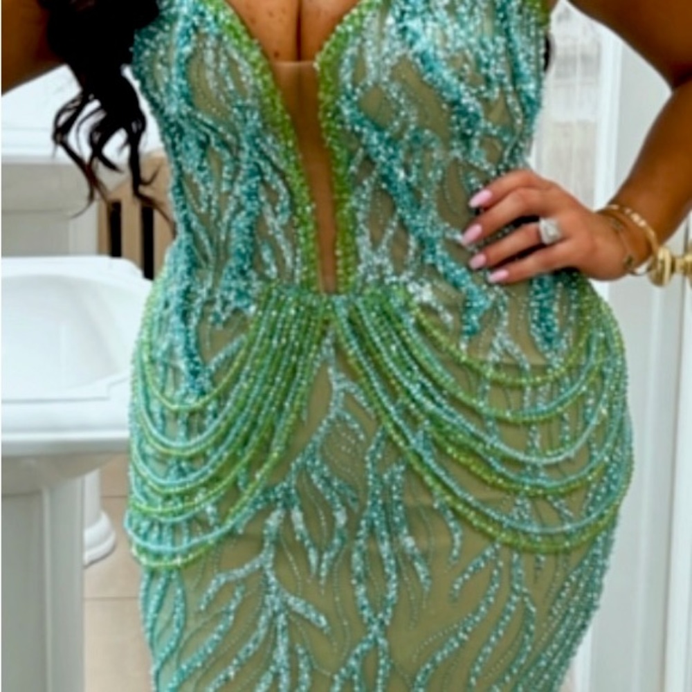 SOLD!!!! Gorgeous custom Fjolla Naile gown. Green and blue crystals
